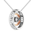 Load image into Gallery viewer, 10K Two Tone 1/5 Ct Ct.Tw. Diamond Oval Shape Shimmering Pendant